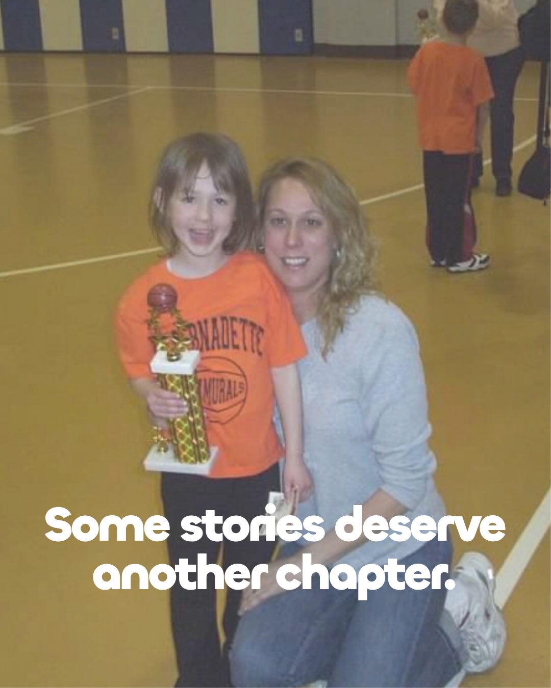 Young Ashley holding a basketball trophy. Some stories deserve another chapter.
