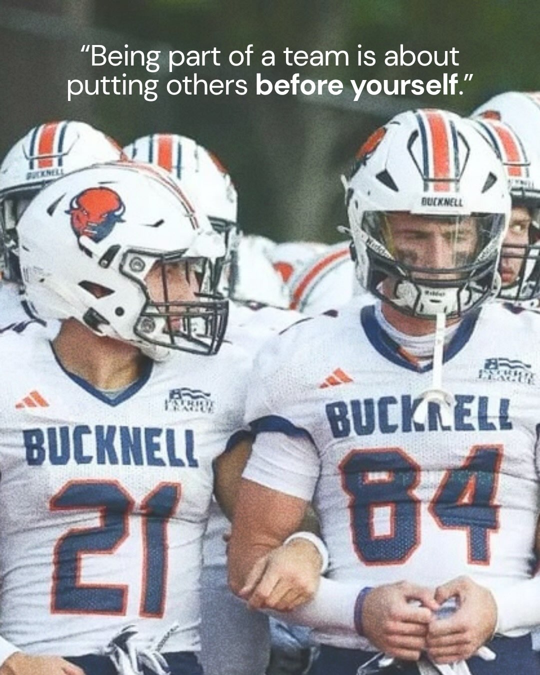 Sam Milligan, number 84, walking out with a teammate